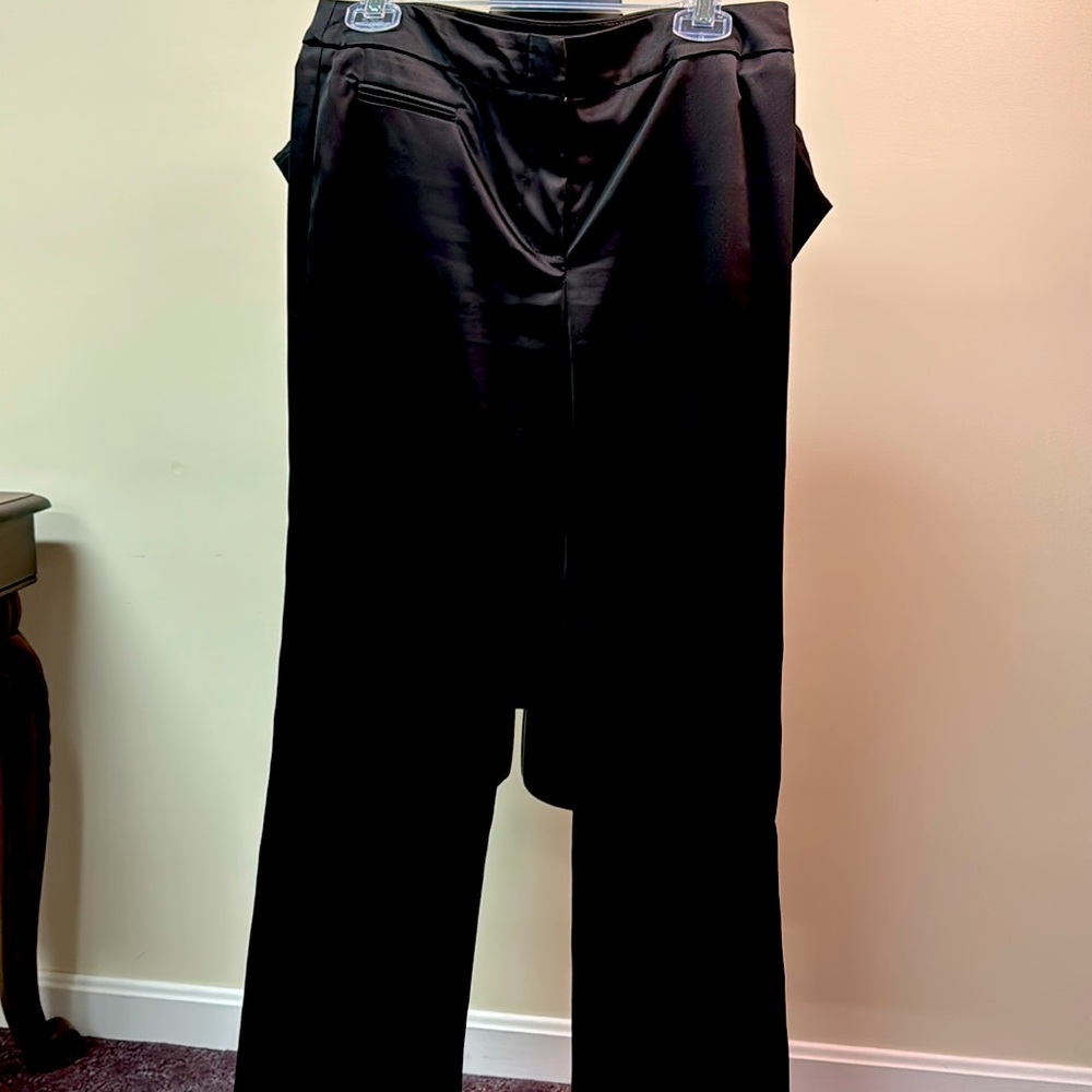 Black satin pants size 8, and small pocket in the front